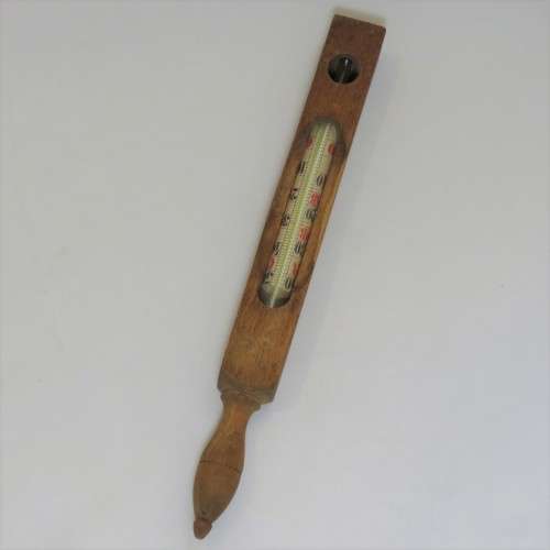 Vintage Thermometer in wooden stick