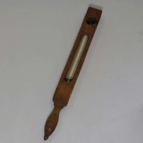 Vintage Thermometer in wooden stick