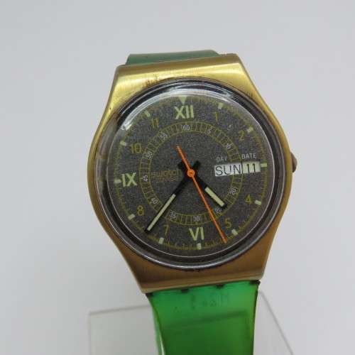 Swatch watch with green strap - Buckle missing - Flaw on lens
