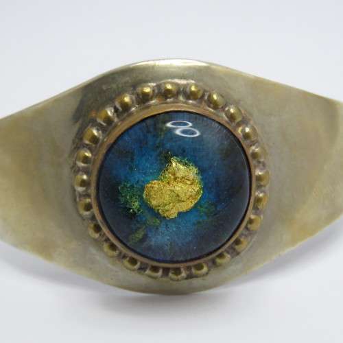 Vintage costume jewellery bangle with resin insert