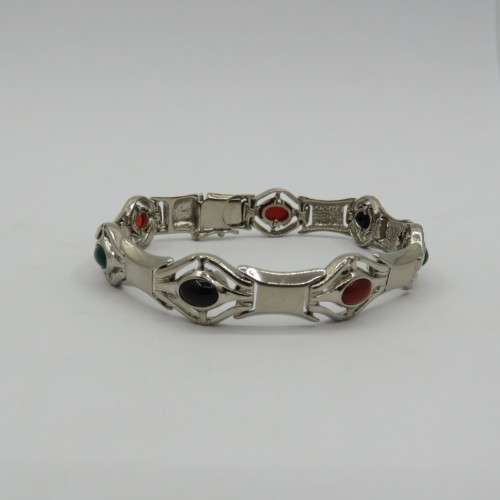 Costume jewellery unused silver look alike bracelet with colored stones