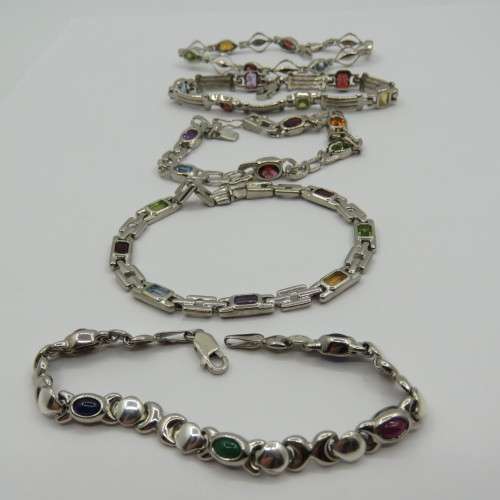 Lot of 5 silver look alike bracelets with colored stones - never used