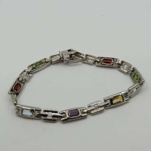 Lot of 5 silver look alike bracelets with colored stones - never used