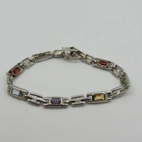 Lot of 5 silver look alike bracelets with colored stones - never used