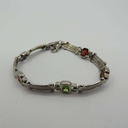 Lot of 5 silver look alike bracelets with colored stones - never used