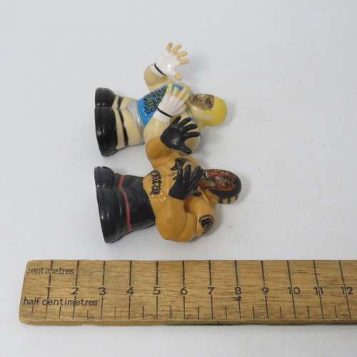 Set of 4 Wicked cool WWE wrestling Thumbpers figurines