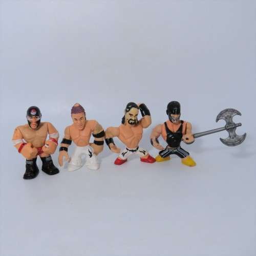 Lot of 4 WWE Rumblers figurines