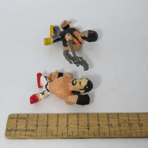 Lot of 4 WWE Rumblers figurines