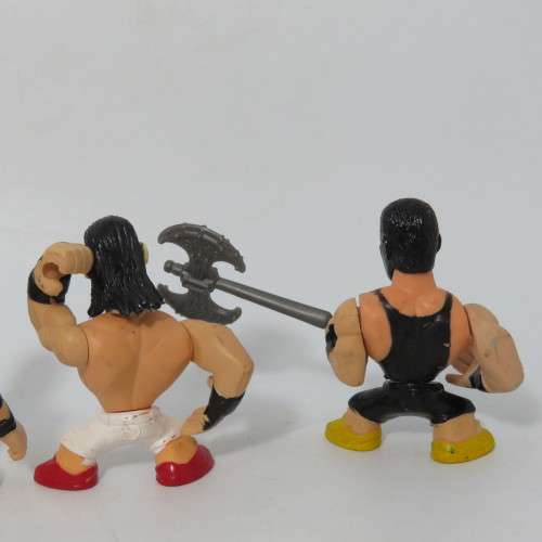 Lot of 4 WWE Rumblers figurines