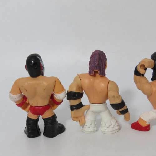 Lot of 4 WWE Rumblers figurines