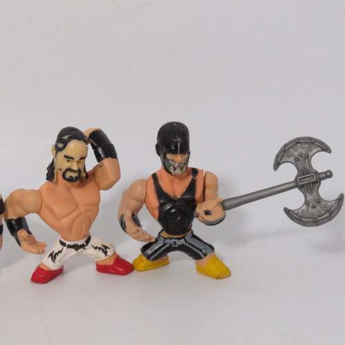 Lot of 4 WWE Rumblers figurines