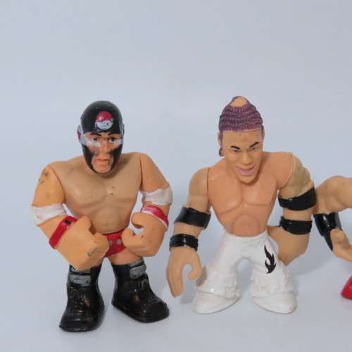 Lot of 4 WWE Rumblers figurines