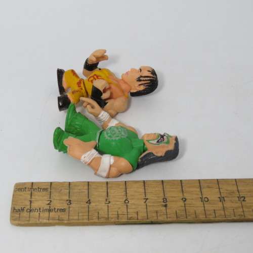 Lot of 4 WWE Rumblers figurines