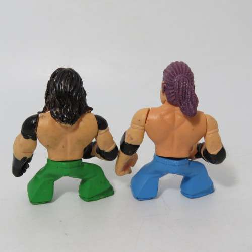 Lot of 4 WWE Rumblers figurines