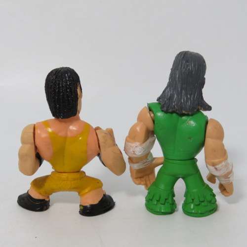Lot of 4 WWE Rumblers figurines