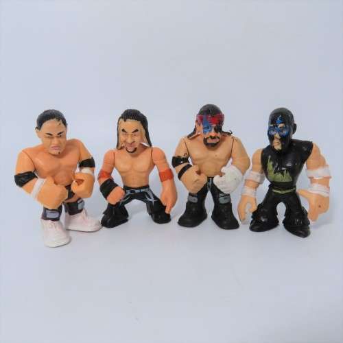 Lot of 4 WWE Rumblers figurines