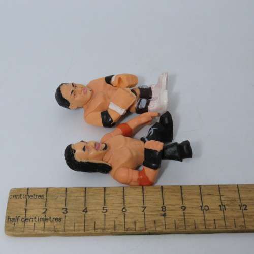 Lot of 4 WWE Rumblers figurines