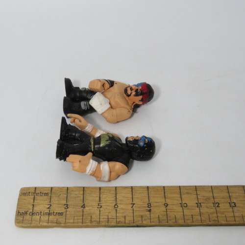 Lot of 4 WWE Rumblers figurines