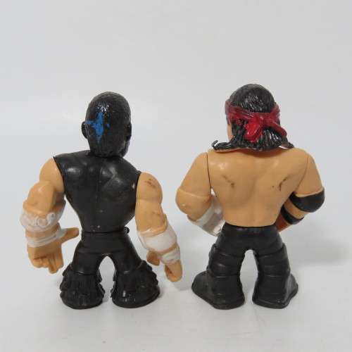 Lot of 4 WWE Rumblers figurines