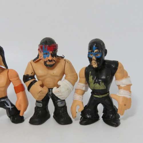 Lot of 4 WWE Rumblers figurines