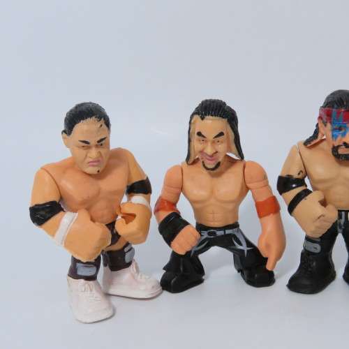 Lot of 4 WWE Rumblers figurines