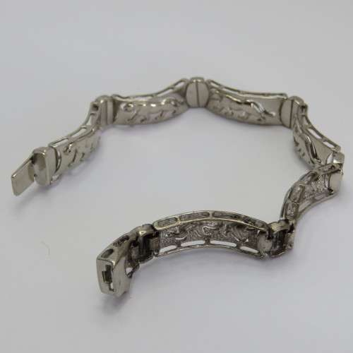 Costume silver look-alike bracelet with leopard