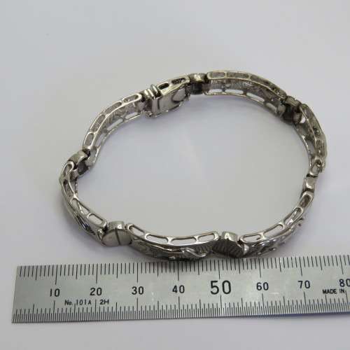 Costume silver look-alike bracelet with leopard