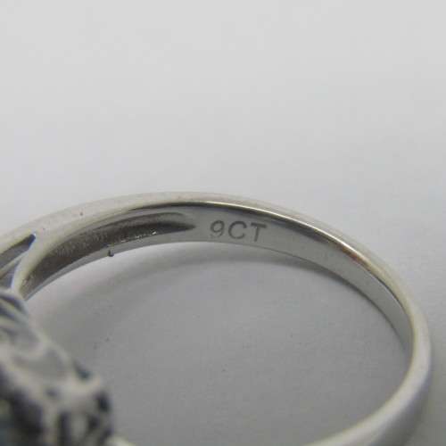 9kt Gold ring with blue Topaz and small diamonds of 0.13ct - weighs 3.5g - size N/7 - new never worn