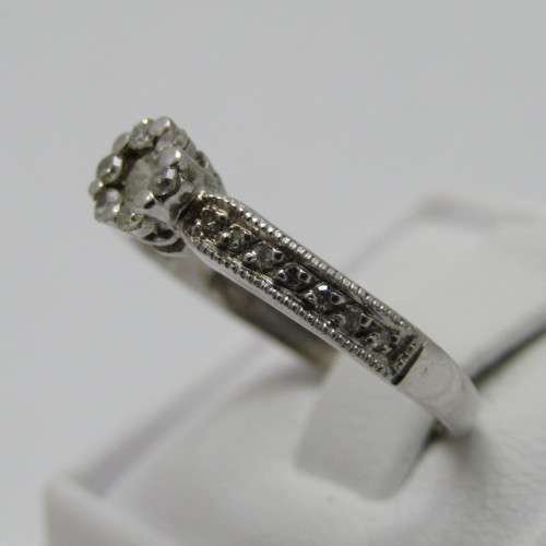 9kt White Gold diamond ring with 0.10ct diamond and smaller 0.15ct in total - weighs 2.2g - size L/6