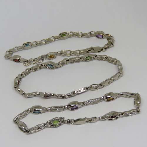 Costume lot of 3 silver look-alike bracelets with colored stones - Never used