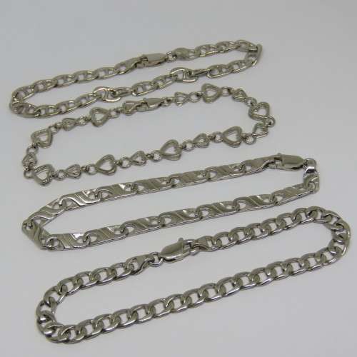 Costume lot of 4 silver look-alike bracelets - Never used