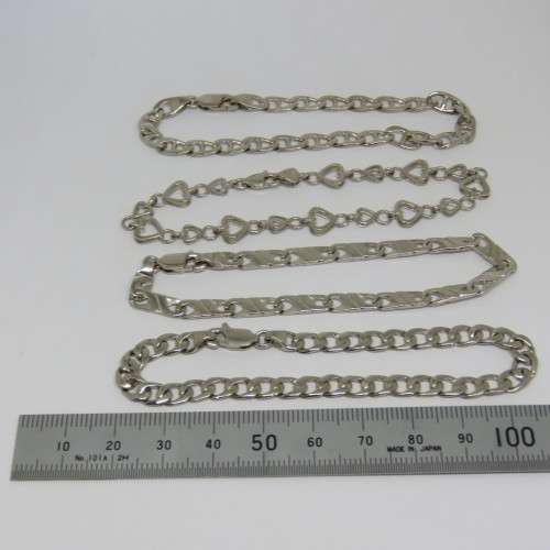 Costume lot of 4 silver look-alike bracelets - Never used