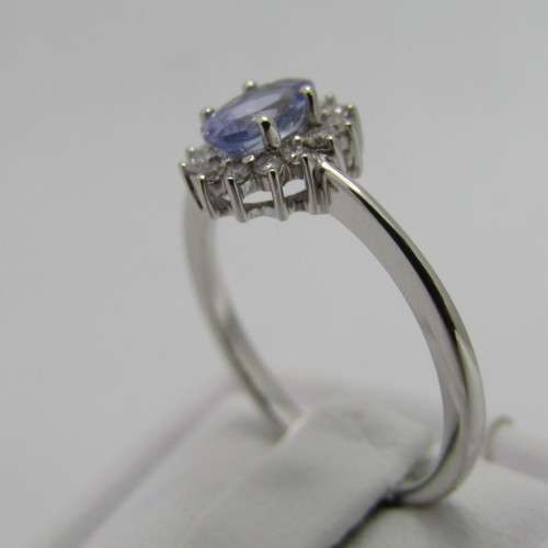 9kt white gold ring with 0.48ct tanzanite and diamonds of 0.11ct in total - weighs 2.4g - size M/6