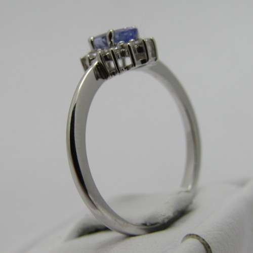 9kt white gold ring with 0.48ct tanzanite and diamonds of 0.11ct in total - weighs 2.4g - size M/6