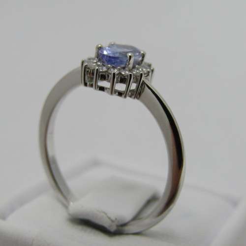 9kt white gold ring with 0.48ct tanzanite and diamonds of 0.11ct in total - weighs 2.4g - size M/6