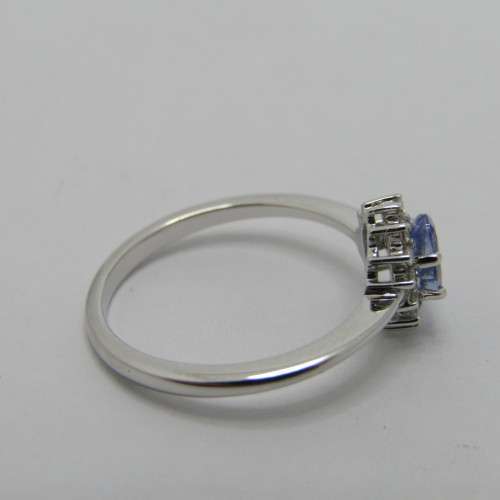 9kt white gold ring with 0.48ct tanzanite and diamonds of 0.11ct in total - weighs 2.4g - size M/6