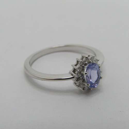 9kt white gold ring with 0.48ct tanzanite and diamonds of 0.11ct in total - weighs 2.4g - size M/6
