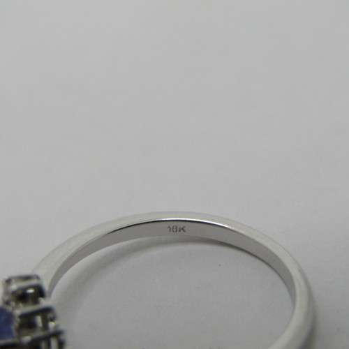 9kt white gold ring with 0.48ct tanzanite and diamonds of 0.11ct in total - weighs 2.4g - size M/6