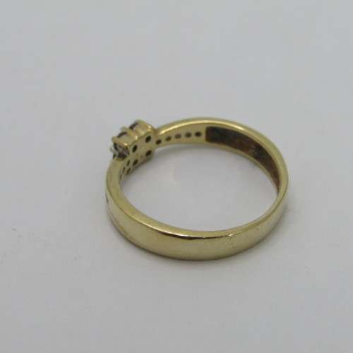 9kt gold ring with 14 small diamonds of about 0.25ct in total - weighs 2.9g - size Q/8