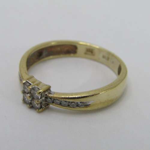 9kt gold ring with 14 small diamonds of about 0.25ct in total - weighs 2.9g - size Q/8