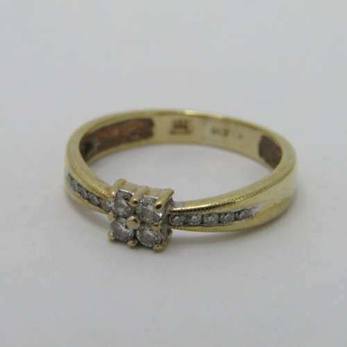 9kt gold ring with 14 small diamonds of about 0.25ct in total - weighs 2.9g - size Q/8