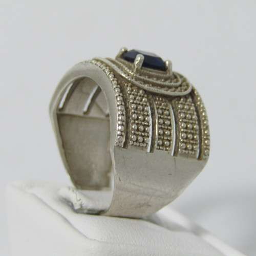 Sterling Silver ring with blue stone - weighs 7.5g - size Q/8