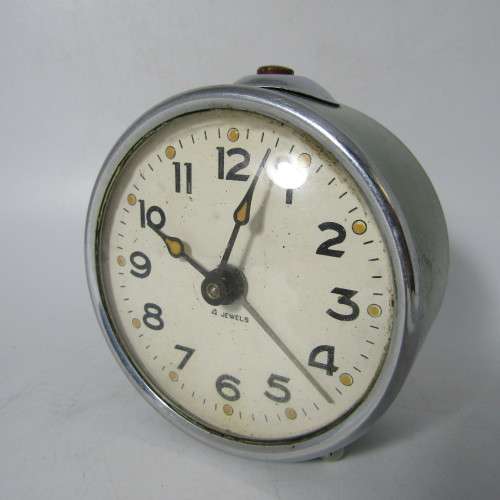 Vintage Bedside Alarm clock - runs and stops - missing winding key