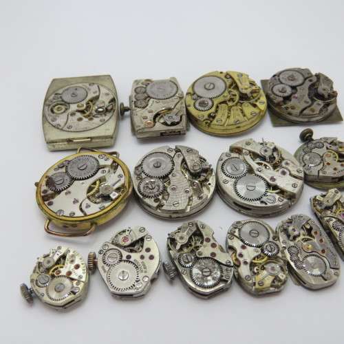 Lot of 14 mechanical watch movements for spares