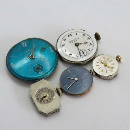 Lot of 5 mechanical watch movements for spares including Omega DeVille Caliber 620 - Not working