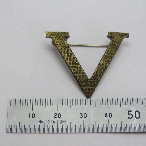 Trench art Victory pin badge