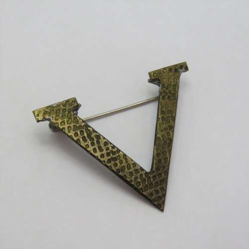 Trench art Victory pin badge