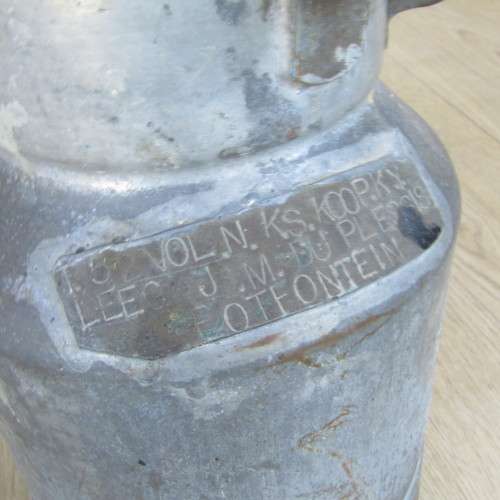 Old metal milk can of J.M. de Plessis from the farm Otfontein - 28.5cm