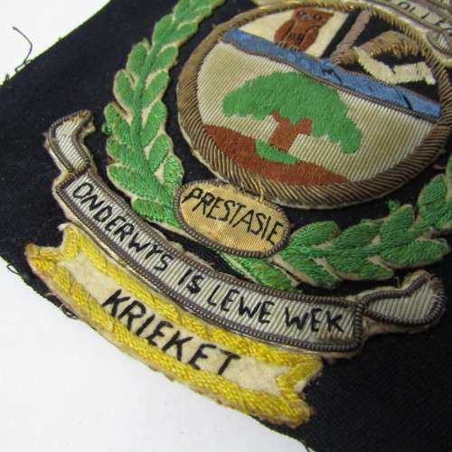 Vintage Potchefstroomse Oderwys Kollege cricket blazer badge