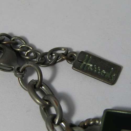 Harrods silver coloured charm bracelet
